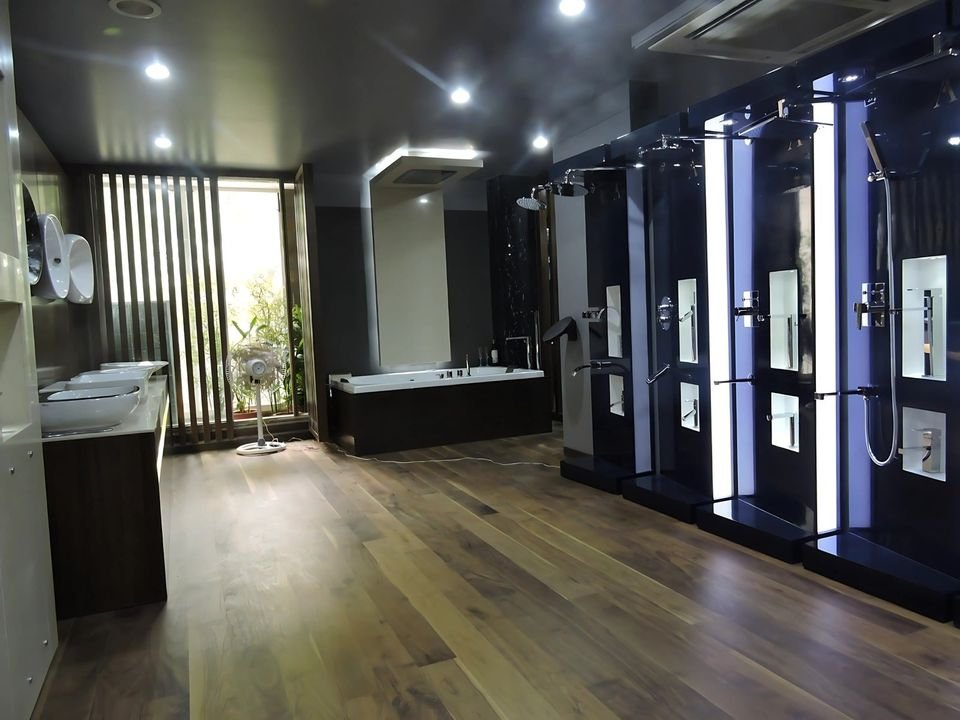 Backlit shower-panel displays and a freestanding bath